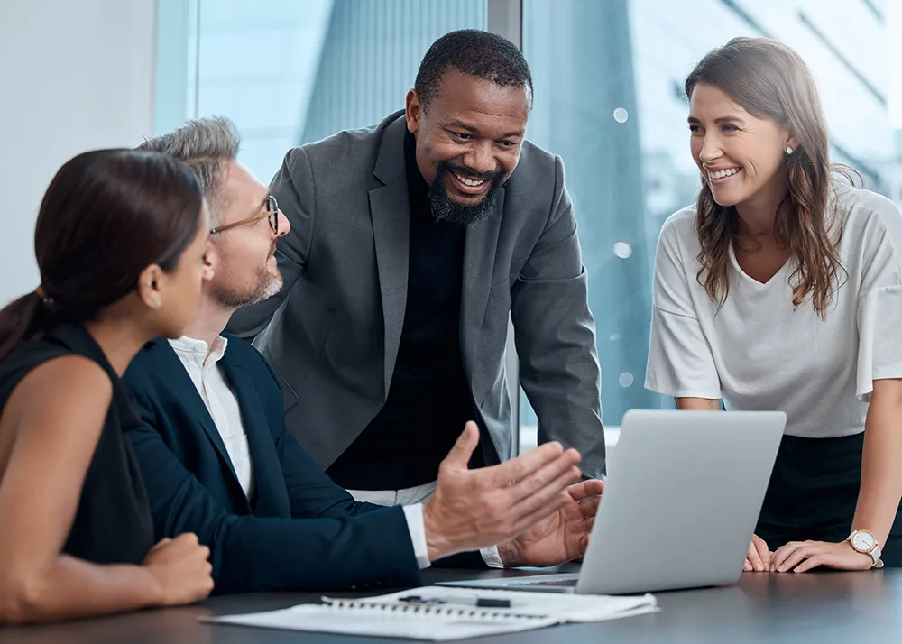 executive business team in a meeting looking at benefits package